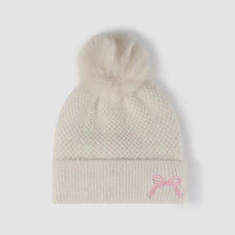 Elevate Your Winter Style with Maven Couture's Luxury Knit Hat