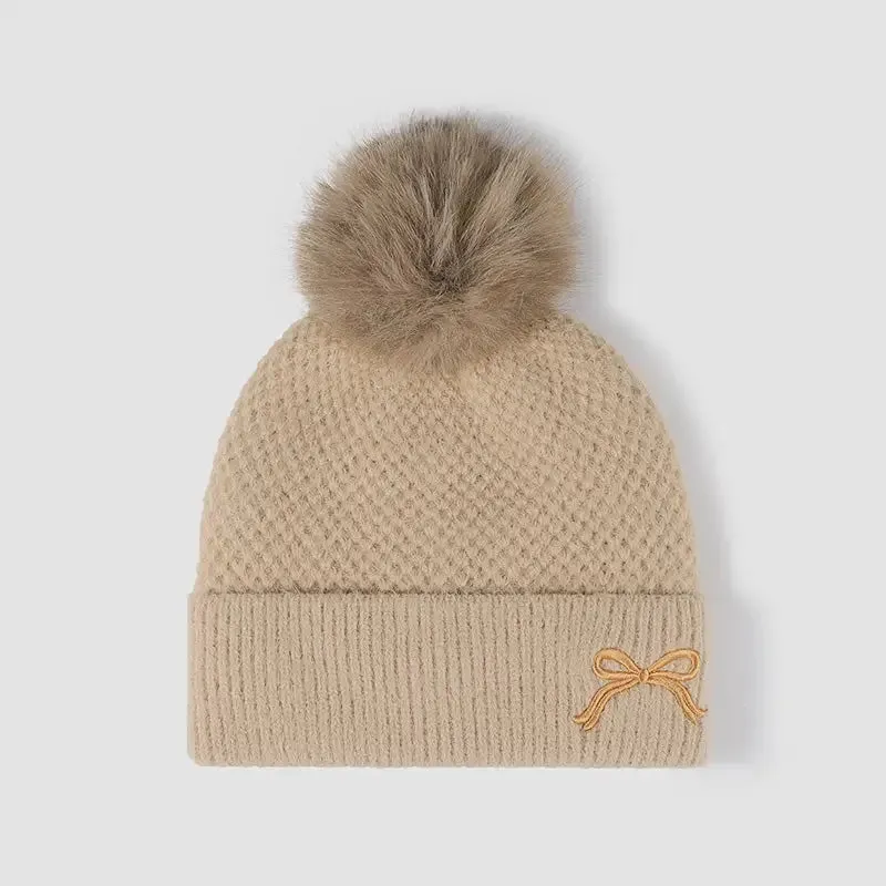 Elevate Your Winter Style with Maven Couture's Luxury Knit Hat