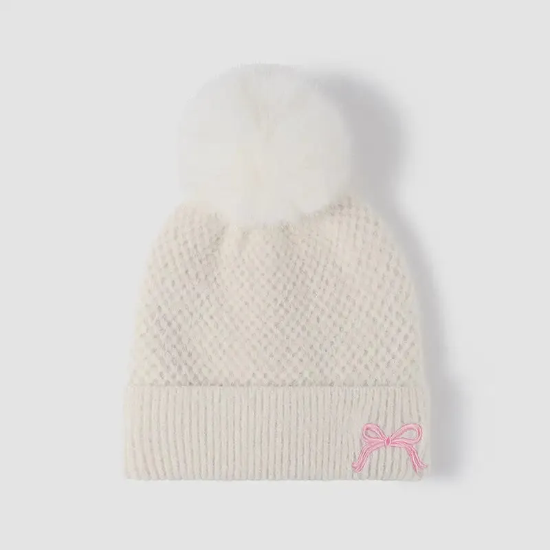 Elevate Your Winter Style with Maven Couture's Luxury Knit Hat