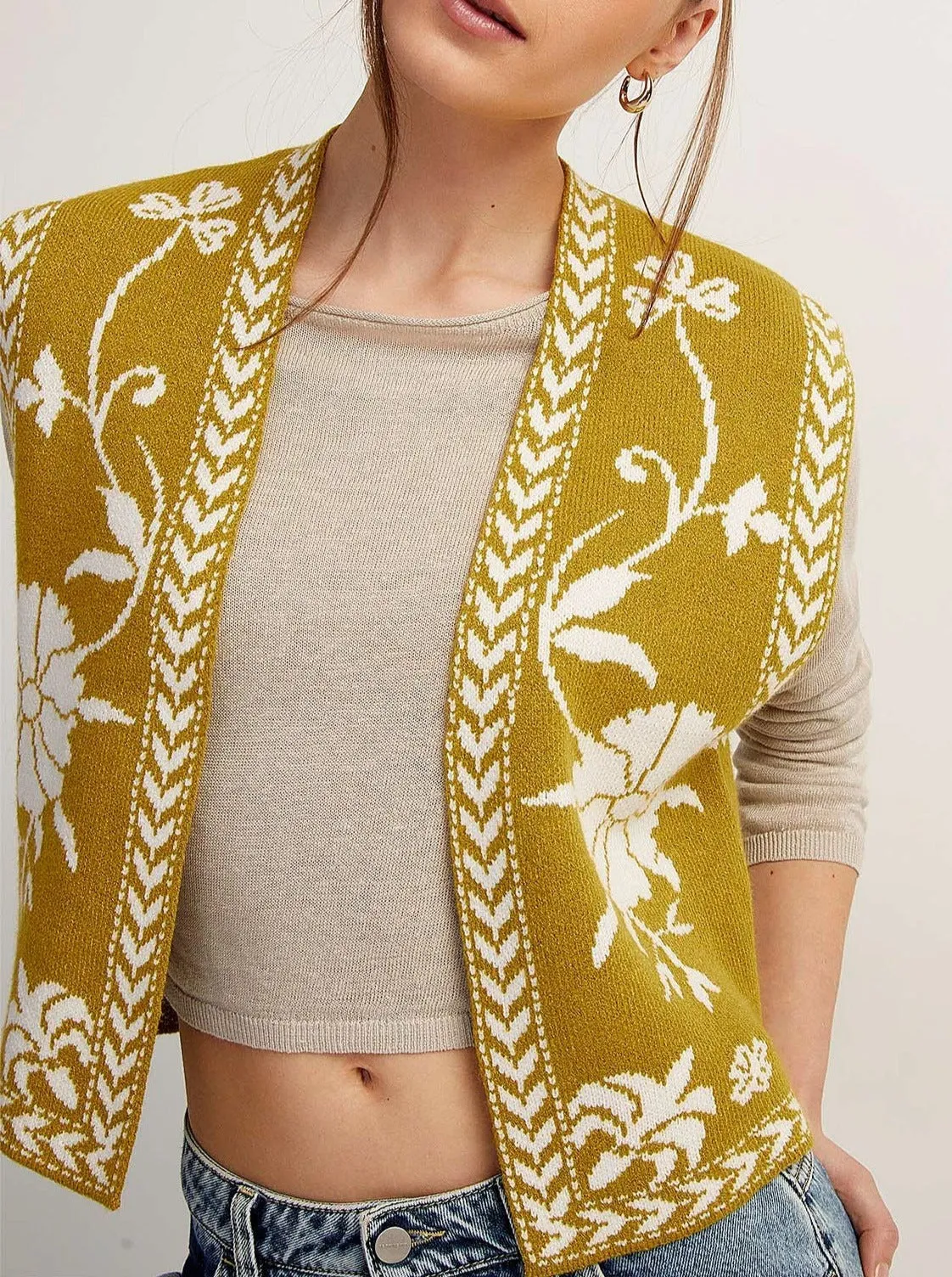 Sleeveless designer knitted vest top